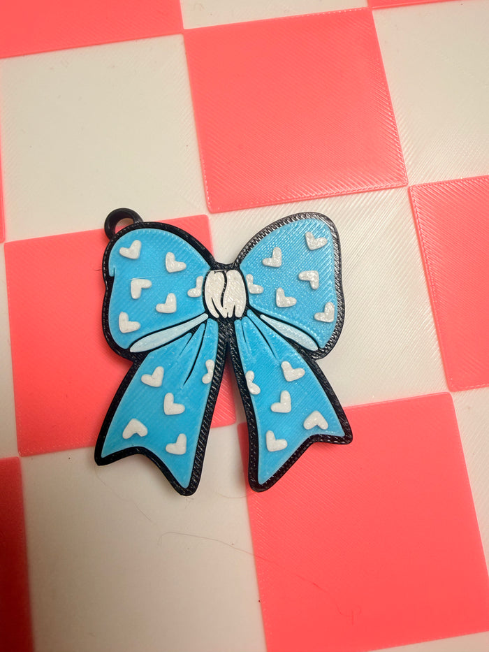 Bow pop tab nail saver