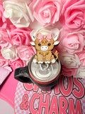 Highland cow with Bow can opener