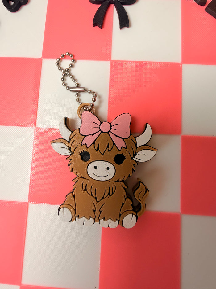 Highland cow with Bow can opener