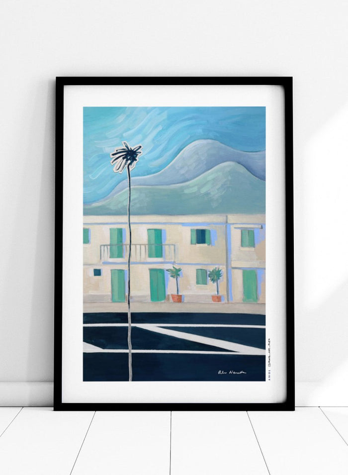 Alpes Maritimes With Palm Tree by Awol Art Alex is a modern French Riviera art print featuring a tall palm, mountain views, pastel buildings, and coastal color.