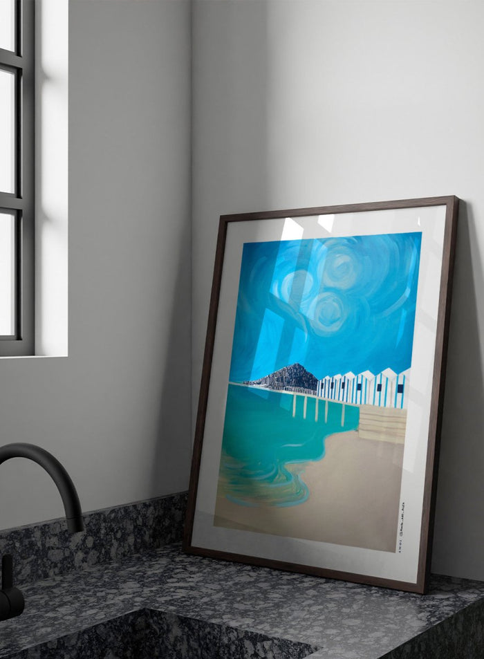 Vibrant Coastal Huts by Awol Art Alex is a modern coastal art print featuring striped beach huts, turquoise water, bold blue sky, and graphic seaside style.