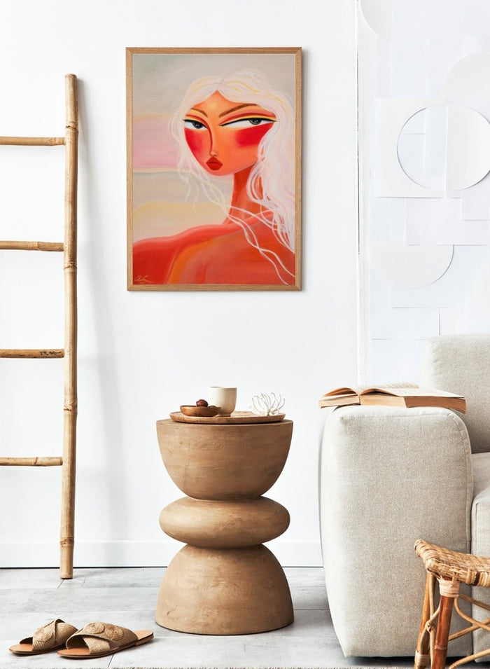 Abstract painting of a woman with a stylized face and flowing hair. Blonde Sunset Gaze by Amy Straley is a contemporary figurative art print featuring a feminine portrait, warm sunset tones, and modern expressive wall art.
