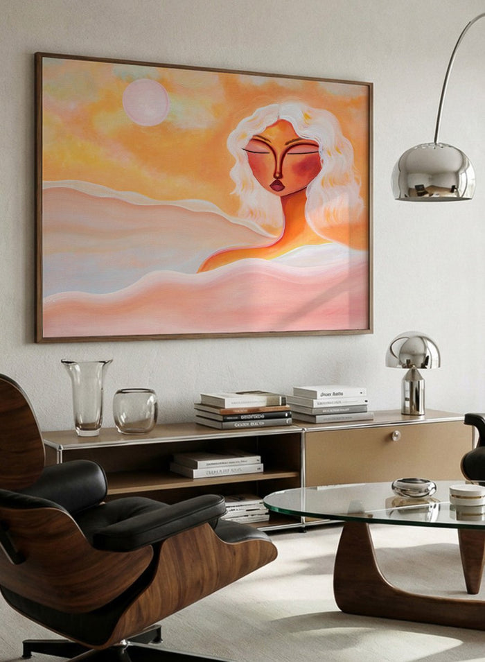 Framed abstract artwork with a woman's face and warm colors. Golden Hour Dreamer by Amy Straley is a contemporary figurative art print featuring warm sunset tones, a feminine portrait, and expressive modern artwork.