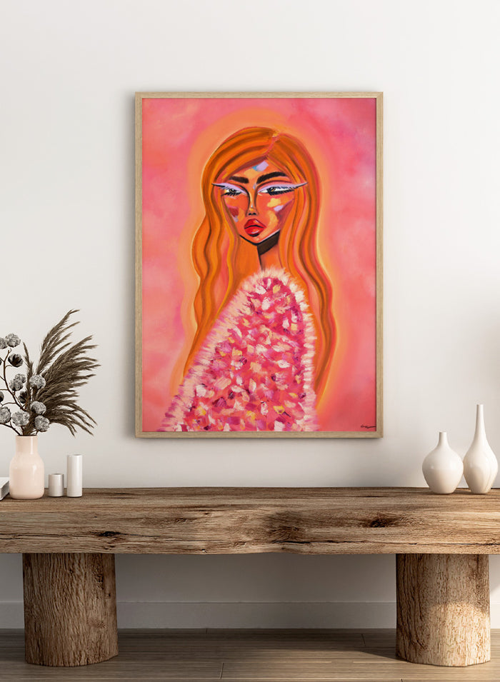 A stylized portrait painting of a woman with long flowing orange hair, a pink and white textured garment, and a pink background. Shop Pink Fur Glamour by Amy Straley, a contemporary figurative wall art print featuring a glamorous woman portrait, orange hair, and vivid pink tones.