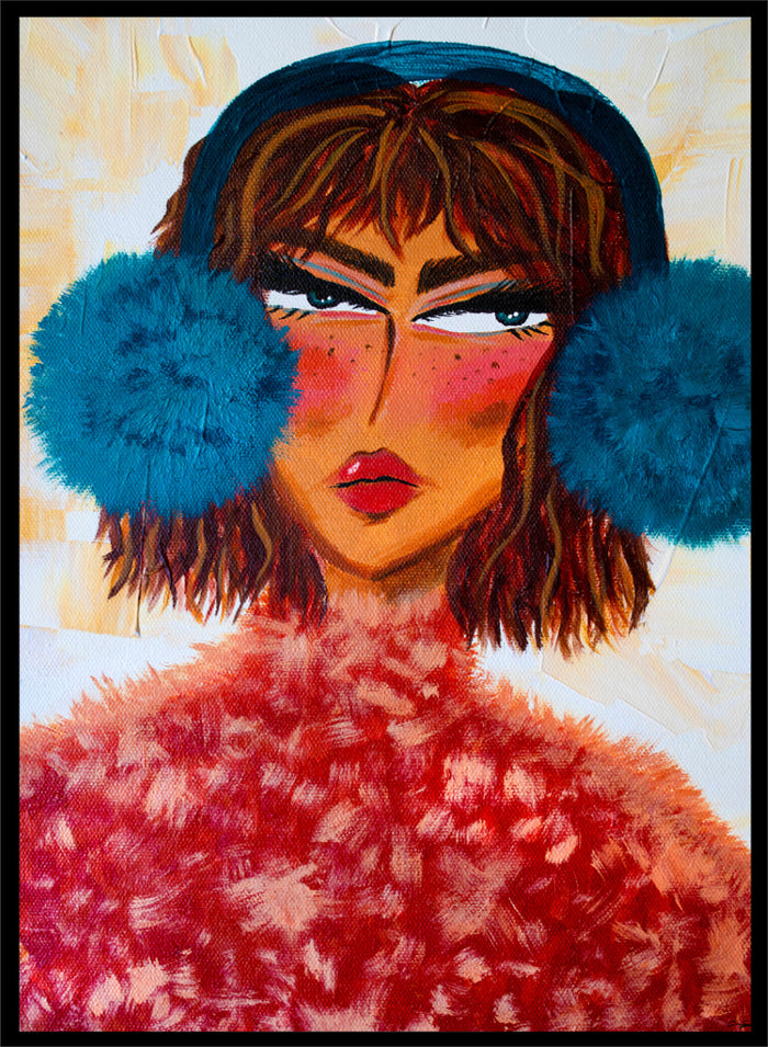 A stylized portrait painting of a woman with brown hair, a dark blue head covering, large bright blue pom-pom ear muffs, and a textured red fuzzy garment, set against a warm cream background. Shop Sassy Earmuffs Portrait by Amy Straley, a contemporary figurative wall art print featuring a bold woman portrait, blue earmuffs, and vivid pink and red tones.