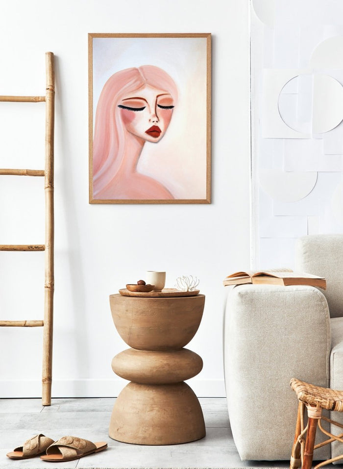 Artistic illustration of a woman's face with closed eyes on a light background. Serene Pink Portrait by Amy Straley is a contemporary figurative art print featuring a feminine portrait, soft pink tones, and modern expressive wall art.
