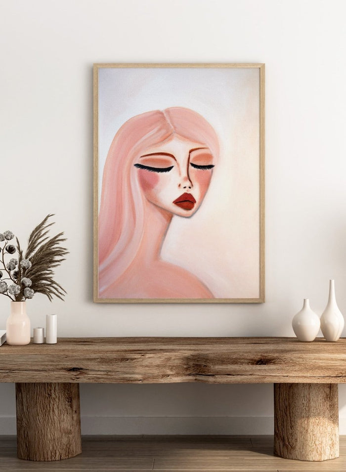 Artistic illustration of a woman's face with closed eyes on a light background. Serene Pink Portrait by Amy Straley is a contemporary figurative art print featuring a feminine portrait, soft pink tones, and modern expressive wall art.