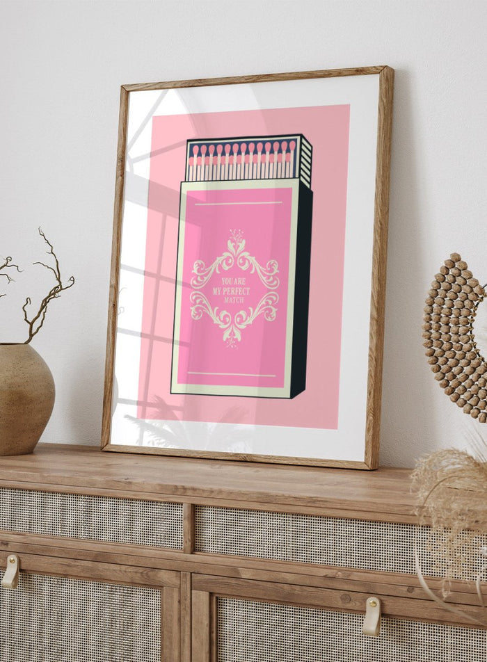 Matchbox with decorative design and text on a pink background. My Perfect Match by Andreas Magnusson is an officially licensed art print featuring a pink matchbox and playful typography. Modern graphic love poster.