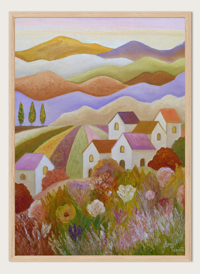 A colorful landscape painting featuring rolling hills, stylized houses, cypress trees, and wildflowers in the foreground, rendered in a painterly impressionistic style. Shop Colorful Countryside Village by Angeles M. Pomata, an autumn landscape art print featuring white houses, rolling hills, wildflowers, and warm earthy tones.