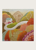 A framed landscape painting featuring a winding white road through colorful hills, a small white house, and a mountain in the background. Shop Colorful Hillside Home by Angeles M. Pomata, an autumn landscape art print featuring a winding road, white country house, rolling hills, and wildflowers.