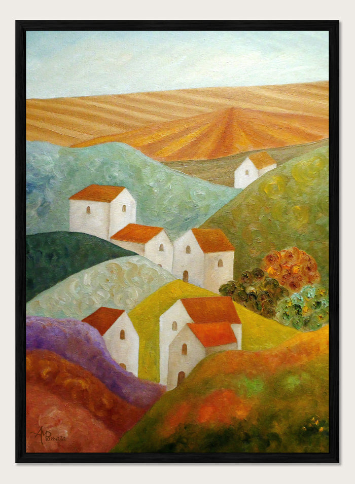 A colorful landscape painting featuring white houses with orange-red roofs nestled among rolling hills in shades of green, purple, yellow, and orange, with a plowed field under a pale sky in the background. Shop Colorful Hillside Village by Angeles M. Pomata, an autumn countryside art print featuring white houses, rolling hills, warm fields, and earthy color.