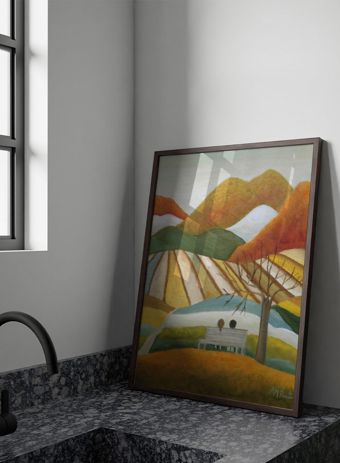 A stylized landscape painting with layered mountains, terraced fields, a bare tree, and two small figures seated on a bench in the foreground. Shop Couple On Autumn Bench by Angeles M. Pomata, an autumn landscape and figurative art print featuring a seated couple, rolling hills, patchwork fields, and warm fall tones.