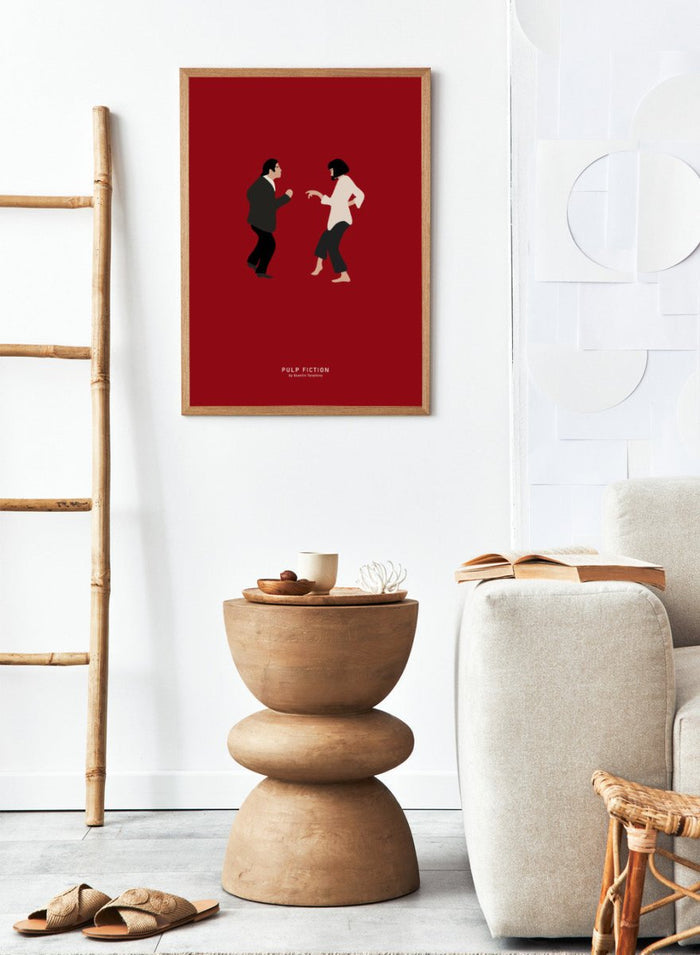 Minimalist illustration of two characters facing each other on a red background with 'Pulp Fiction' text. Minimalist dance illustration of two figures on a red background by Anne-Marie Volfova. Officially licensed modern art print with optional framing.