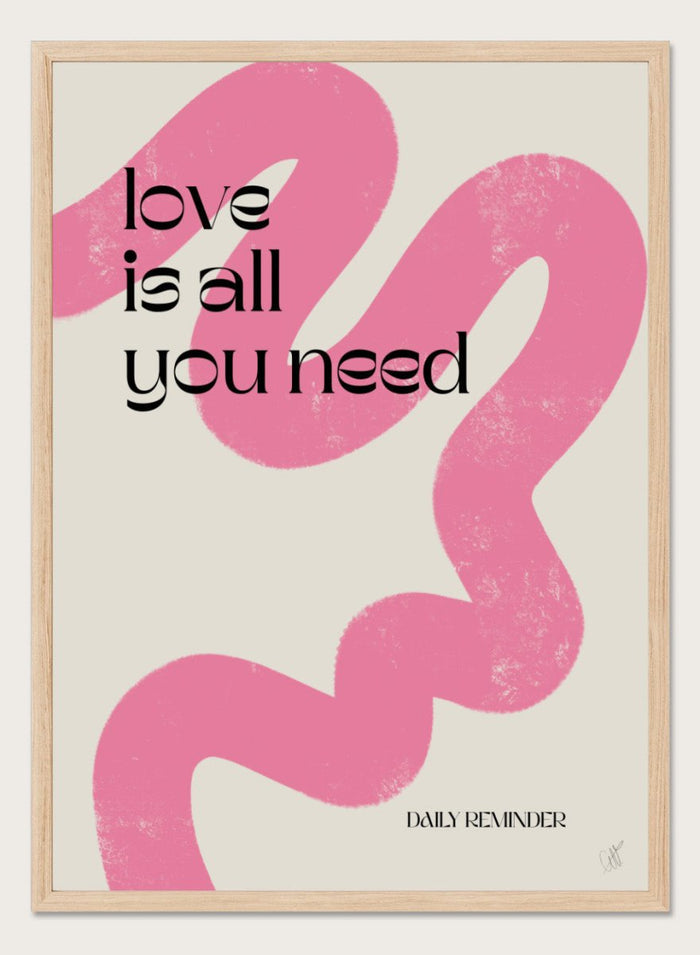 Poster with pink abstract design and 'love is all you need' text on a light background. Love Is All You Need by Anne-Marie Volfova is a typography art print with bold lettering and pink abstract brushstrokes. A modern love wall poster.