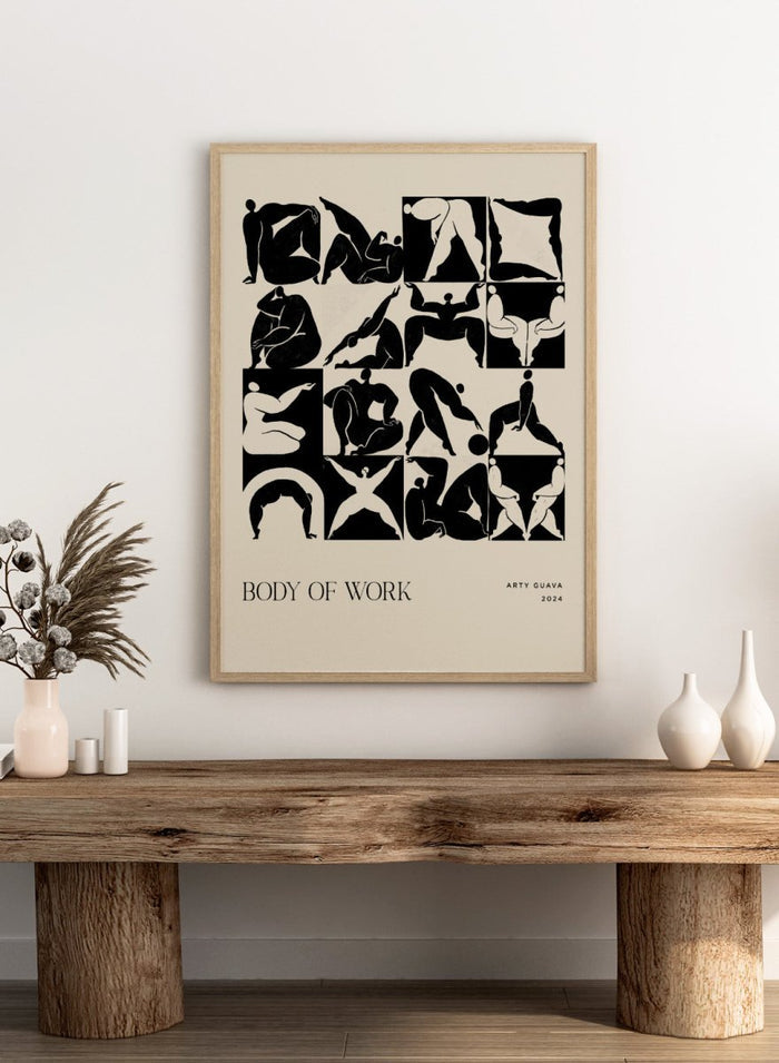 Artistic poster with black silhouettes of people on a beige background, featuring the text 'Body of Work' and 'Arty Guava 2024'. Body of Work (Forest) by Arty Guava is a modern figure art print with green silhouettes in motion. Officially licensed wall poster with framing.