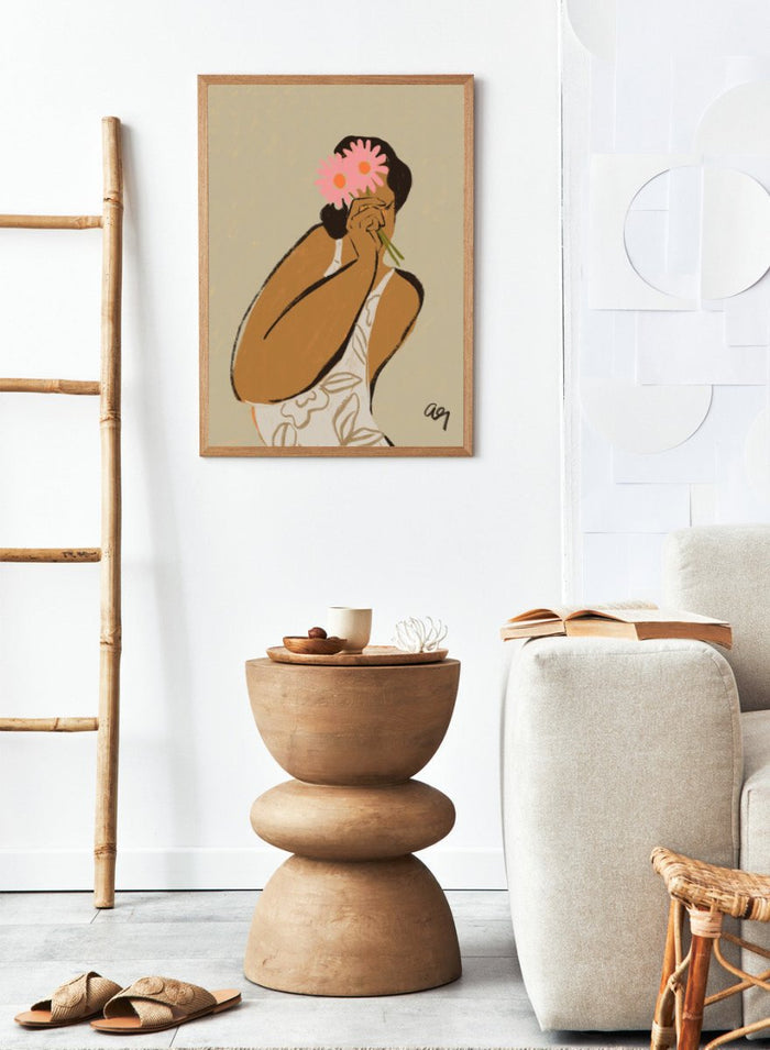 Illustration of a person holding a pink flower to their face against a beige background. Mask by Arty Guava art print, modern woman illustration holding flowers, contemporary figurative wall poster in soft neutral tones.