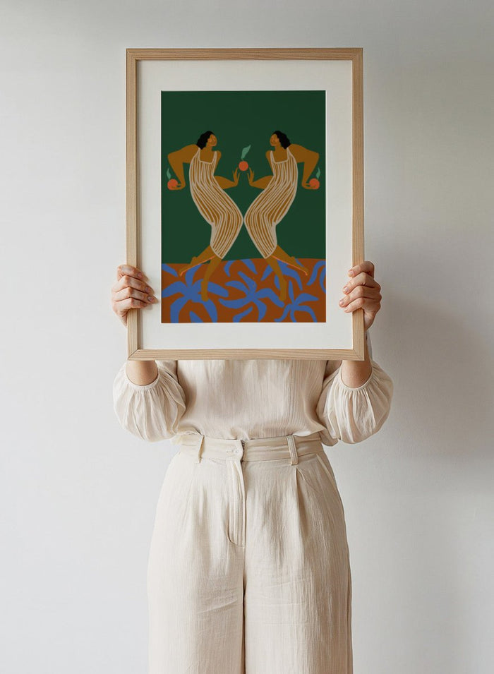 Artistic depiction of two women in a mirror, holding apples, with a green background and blue plant-like shapes at the bottom. Mirror by Arty Guava art print, modern woman illustration with oranges, contemporary figurative wall poster in bold green and warm tones.