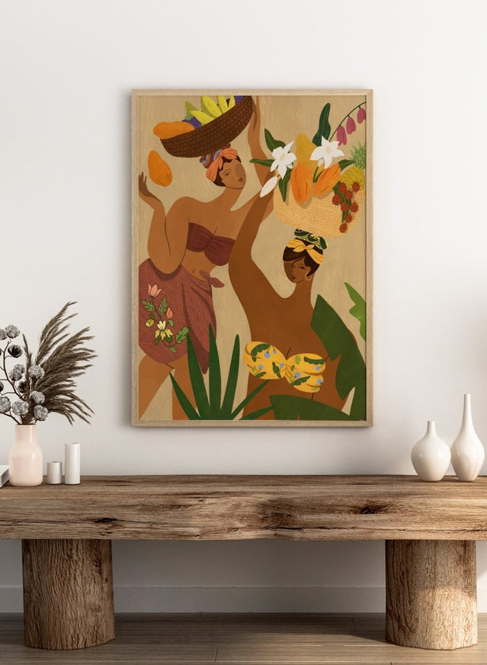 A stylized art print depicting two women in tropical attire carrying baskets of fruit and flowers, framed by green leaves on a warm beige background. Opps Papaya by Arty Guava premium framed fine art print featuring two women carrying baskets of tropical fruit in rich, warm colors.