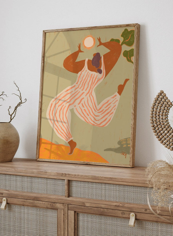 Artistic depiction of a person in overalls reaching towards the sun on a beige background. Reach For The Sun by Arty Guava is a vibrant modern art print of a woman stretching toward the sun. Officially licensed wall poster with framing.