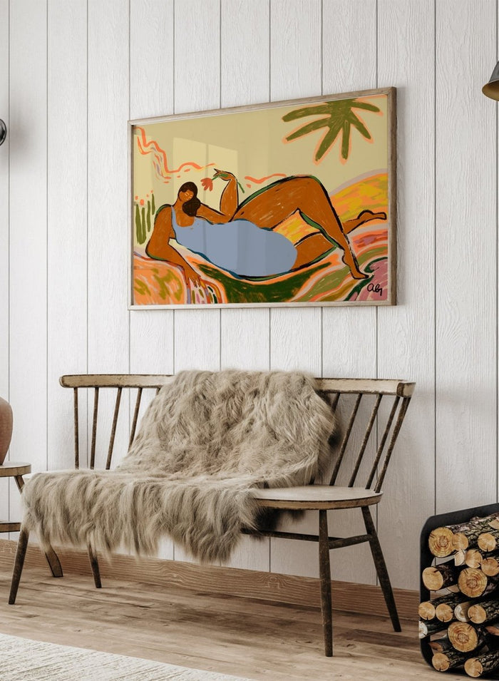 Framed artwork of two abstract figures embracing with a tropical background. Rest and Relax by Arty Guava is a colorful contemporary art print featuring a reclining female figure, tropical motifs, bold color, and nature-inspired illustration.