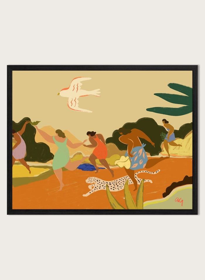 A framed art print featuring a stylized illustration of figures dancing and playing outdoors, with a bird, palm leaves, and a spotted cat. Run by Arty Guava premium framed fine art print featuring women racing through a tropical landscape beside a spotted leopard in warm, playful colors.