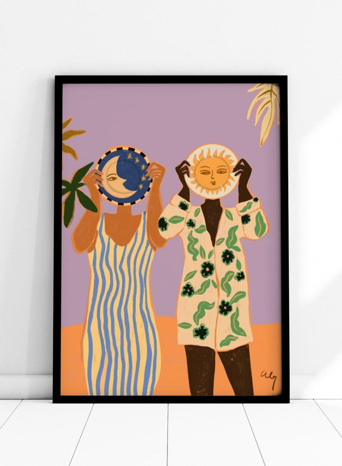 Two people holding celestial objects against a purple background. Sun and Moon by Arty Guava is a playful contemporary art print featuring female figures, celestial motifs, bold color, tropical influences, and modern illustration.