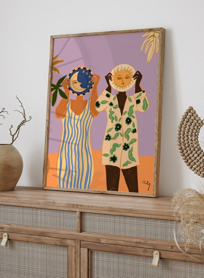 Two people holding celestial objects against a purple background. Sun and Moon by Arty Guava is a playful contemporary art print featuring female figures, celestial motifs, bold color, tropical influences, and modern illustration.