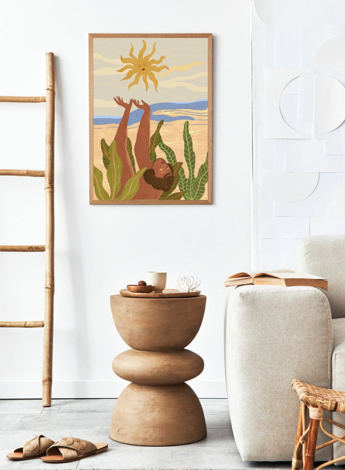 Illustration of a person emerging from water with a sun above, surrounded by plants. Sun Worship by Arty Guava art print, modern woman illustration wall poster with sun and tropical leaves, contemporary nature inspired artwork.