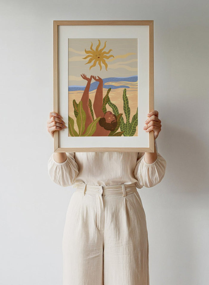 Illustration of a person emerging from water with a sun above, surrounded by plants. Sun Worship by Arty Guava art print, modern woman illustration wall poster with sun and tropical leaves, contemporary nature inspired artwork.