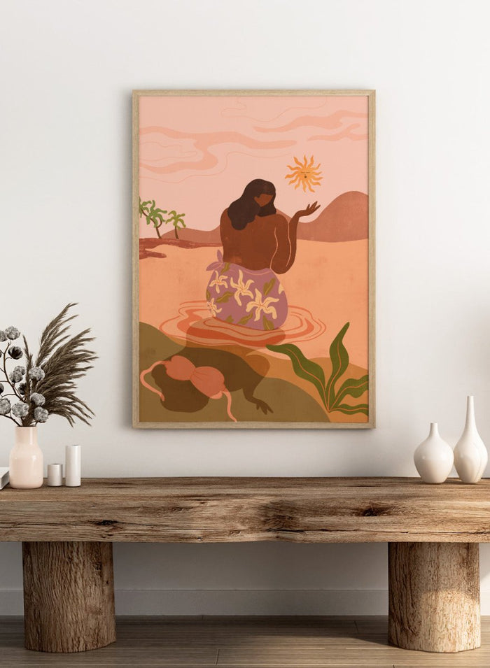 Illustration of a woman in a floral dress sitting by a pool with a sun and desert landscape in the background. Sunset by Arty Guava art print, modern woman illustration wall poster in warm pink tones, contemporary nature landscape artwork.