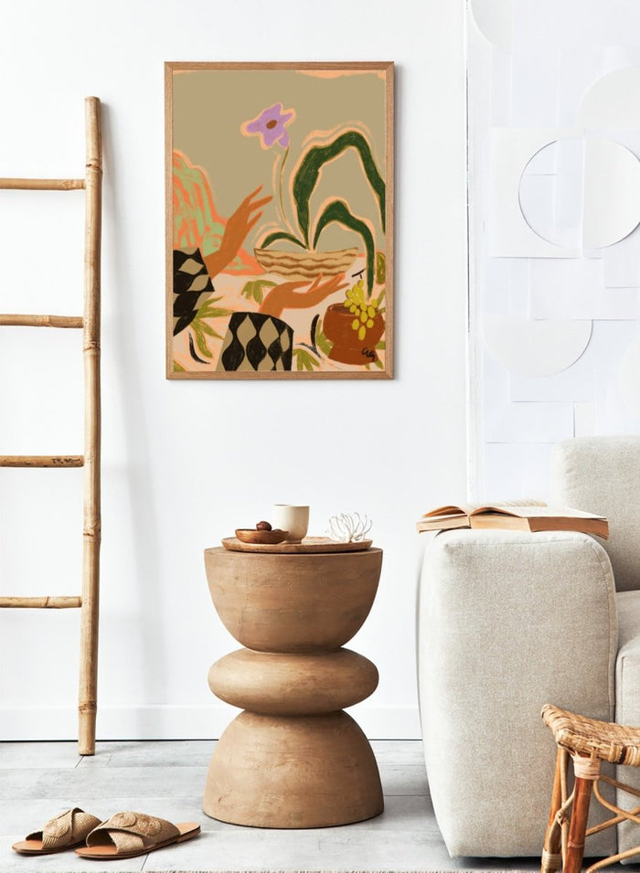 Abstract artwork with hands holding a woven basket and a flower, set against a beige background. The Power Of One by Arty Guava is a nature-inspired art print featuring botanical forms, expressive hands, tropical influences, and contemporary illustration.