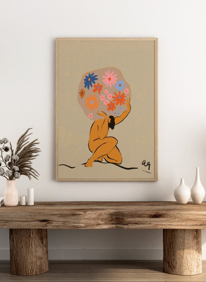 Surreal artwork of a figure holding a globe filled with colorful flowers on a beige background. World On Her Shoulders by Arty Guava is a colorful contemporary art print featuring a floral globe, expressive female figure, empowerment, and modern illustration.