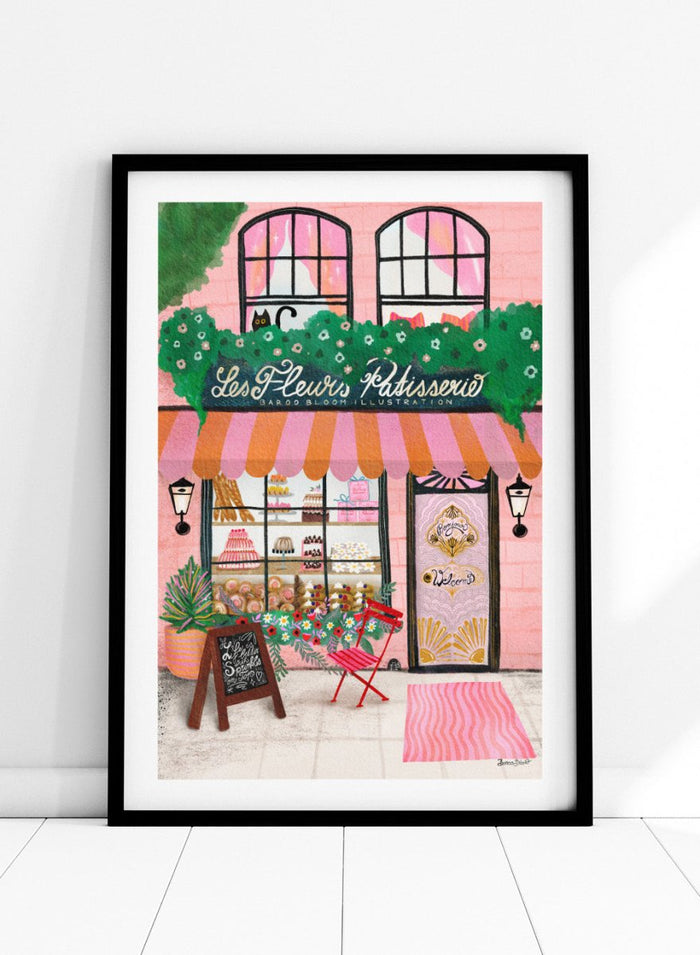 Illustration of a bakery named 'Les Fleuris Patisserie' with a pink exterior and greenery. Bake Shop Front by Baroo Bloom art print featuring a colorful bakery storefront illustration. Whimsical European street scene wall poster with pink tones and playful detail.