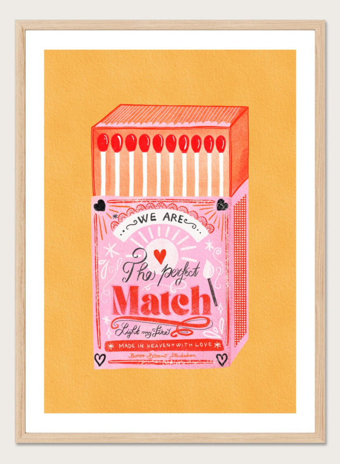 Illustration of a matchbox with 'We are the perfect match' text on a yellow background. Match Box, The Perfect Match by Baroo Bloom is a playful love-themed art print featuring a pink illustrated matchbox. Officially licensed wall poster with optional framing.