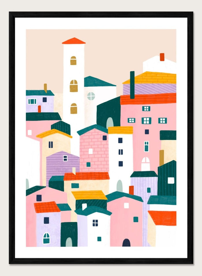A framed minimalist art print depicting a cluster of stylized pastel houses and a church tower in pink, peach, teal, yellow, and cream tones. Charming Colorful Houses by Bea Müller premium framed fine art print featuring a playful town of pink, lavender, cream, and teal buildings.