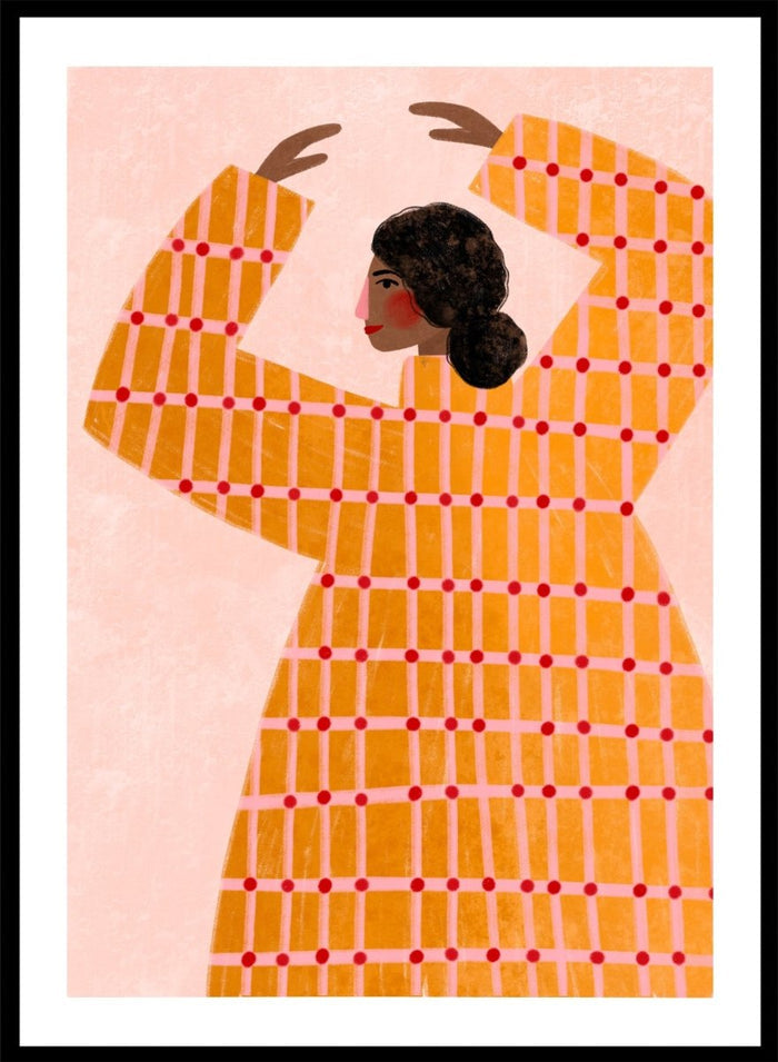 A framed art print featuring a stylized illustration of a woman in profile wearing a bright orange dress with a red grid pattern, set against a pale pink background. Dancing Woman in Orange by Bea Müller premium fine art print featuring a bold figure, warm orange tones, and a playful graphic composition.