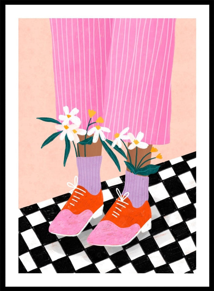 A stylized fashion illustration of a person's legs wearing pink pinstripe trousers, lavender socks, orange and pink shoes, and holding white flowers, set against a peach background with a black-and-white checkered floor. Flowering Oxford Style by Bea Müller premium framed fine art print featuring colorful Oxford shoes, lilac socks, and flowers on a checkered floor.