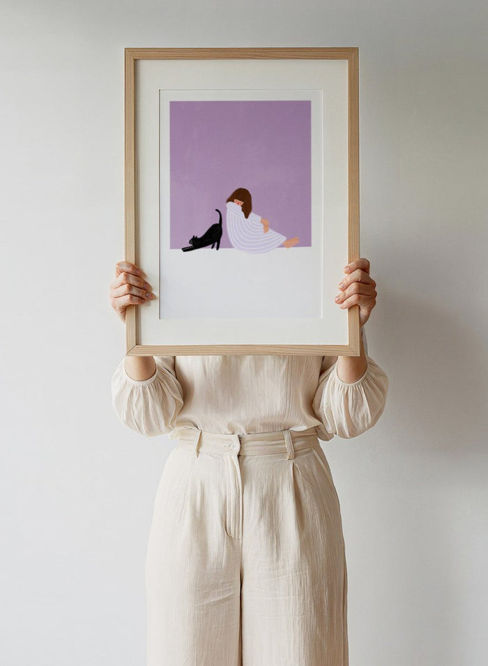 Girl and Cat by Bea Müller is an officially licensed art print featuring a quiet moment between a girl and her cat. Soft colors, modern illustration, available framed or unframed.