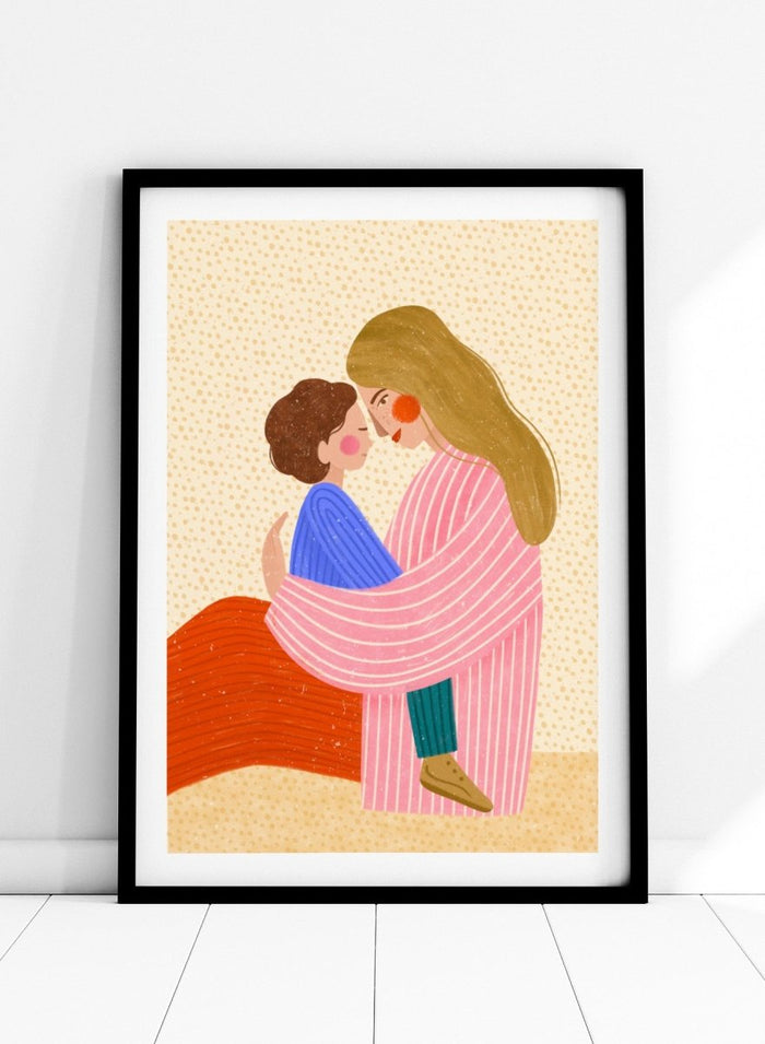 A framed art print featuring a stylized illustration of a woman in a pink striped robe embracing a child in a blue sweater. Loving Mother Child Embrace by Bea Müller premium framed fine art print featuring a mother holding her child close in warm, colorful tones.