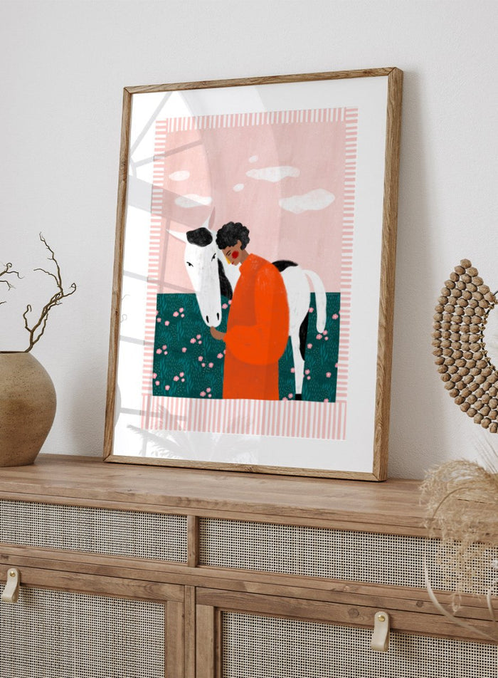 Illustration of a person in an orange outfit hugging a white horse against a pink background with clouds. Vibrant Girl and Horse by Bea Müller is a colorful girl and horse art print featuring modern expressive illustration. Officially licensed wall poster with optional framing.