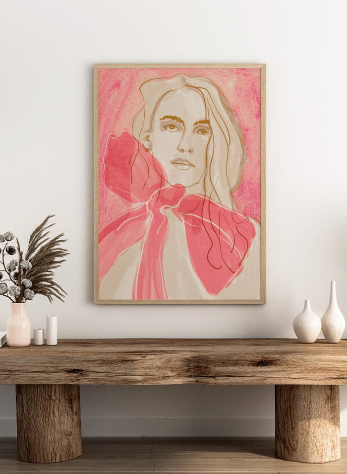 Artistic illustration of a woman with a pink bow tie on a pink background. Ethereal Red by Beate Tubach is a modern portrait art print featuring expressive linework and flowing red tones. A contemporary figurative wall poster.