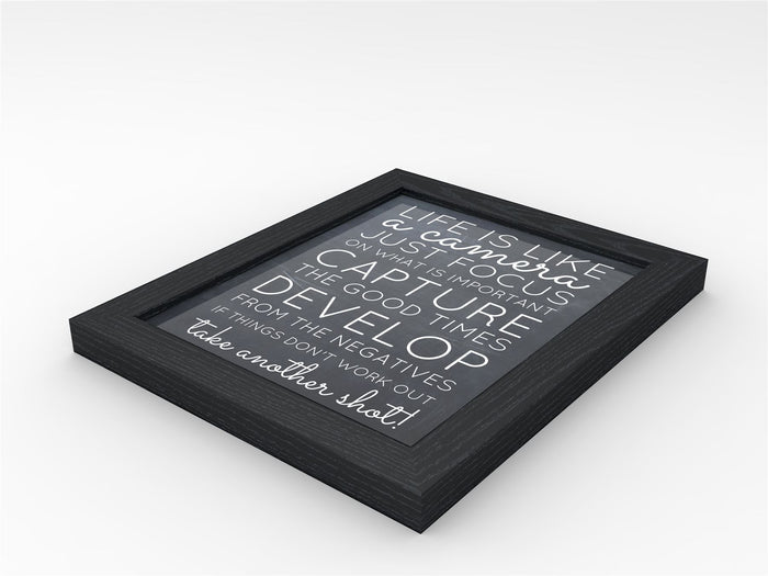 Black picture and poster frame displaying inspiring quote about life and photography.