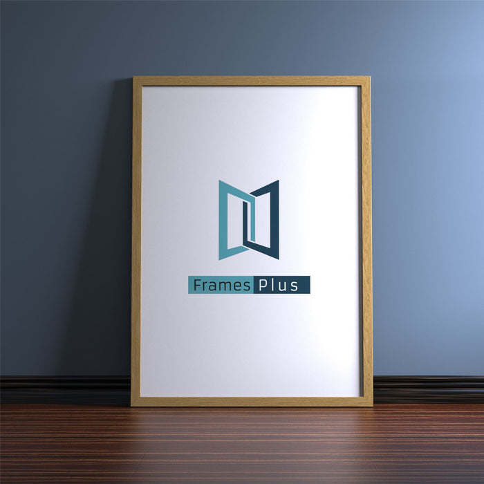 Quality oak picture poster frame showcasing Frames Plus logo on a stylish wall.