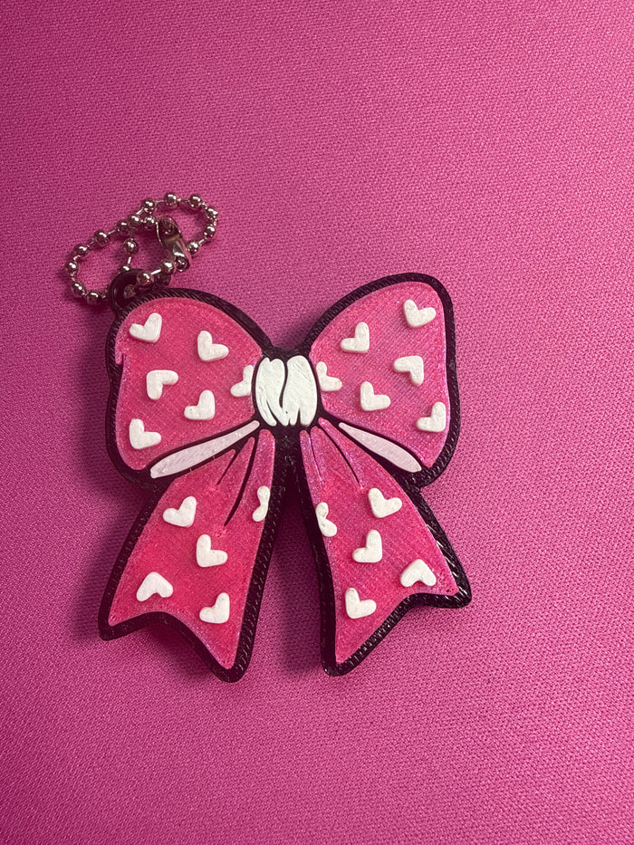 Bow pop tab nail saver