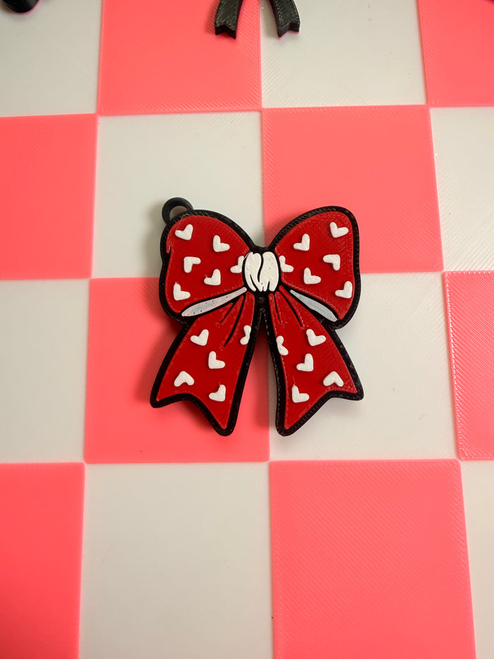 Bow pop tab nail saver