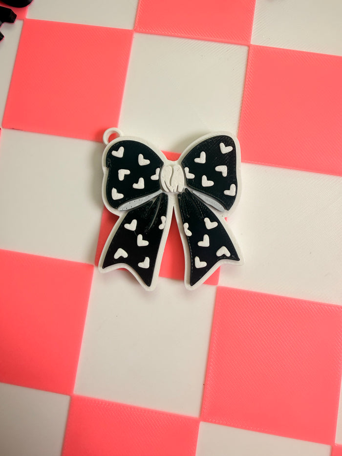 Bow pop tab nail saver