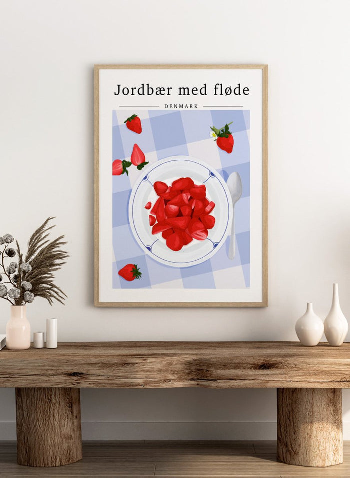 Illustration of strawberries with cream on a plate with a checkered tablecloth, featuring Danish text. Strawberries with Cream by ByKammille is a modern food art print featuring red strawberries in a bowl, clean graphic style with a fresh aesthetic poster design.
