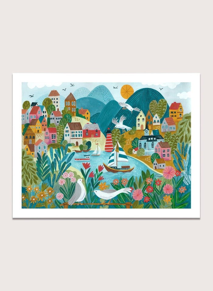Coastal Village by Caroline Bonne Müller is a colorful coastal town art print with boats, lighthouse, and floral foreground in modern aesthetic illustration style.