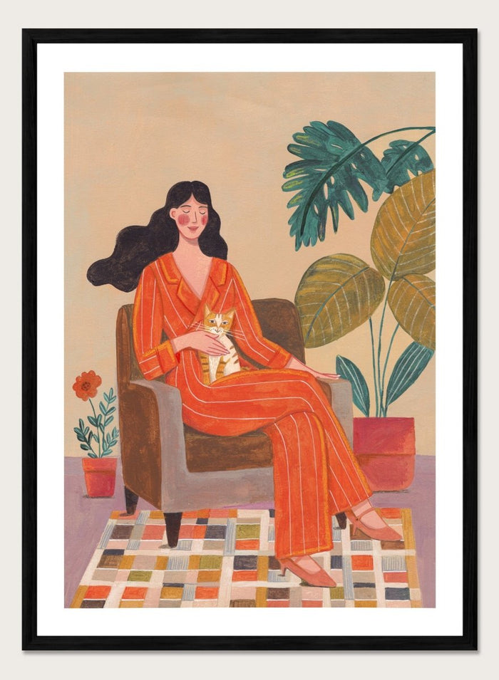 Illustration of a woman in an orange outfit sitting in a chair with plants around her. Cozy Home with Cat by Caroline Bonne Müller is a fine art print and wall poster featuring a woman in an orange outfit sitting with a cat in a warm, plant-filled interior.