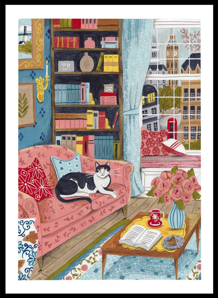 Illustration of a cozy living room with a cat on a pink sofa, bookshelf, and coffee table. Cozy London Cat by Caroline Bonne Müller is a fine art print and wall poster featuring a cat lounging in a colorful living room with a London city view.